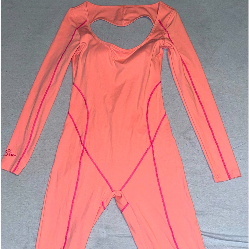 Medium jumpsuit super cute heart cut out in the back!